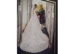 Absolutely STUNNING wedding dress size 10 and double....